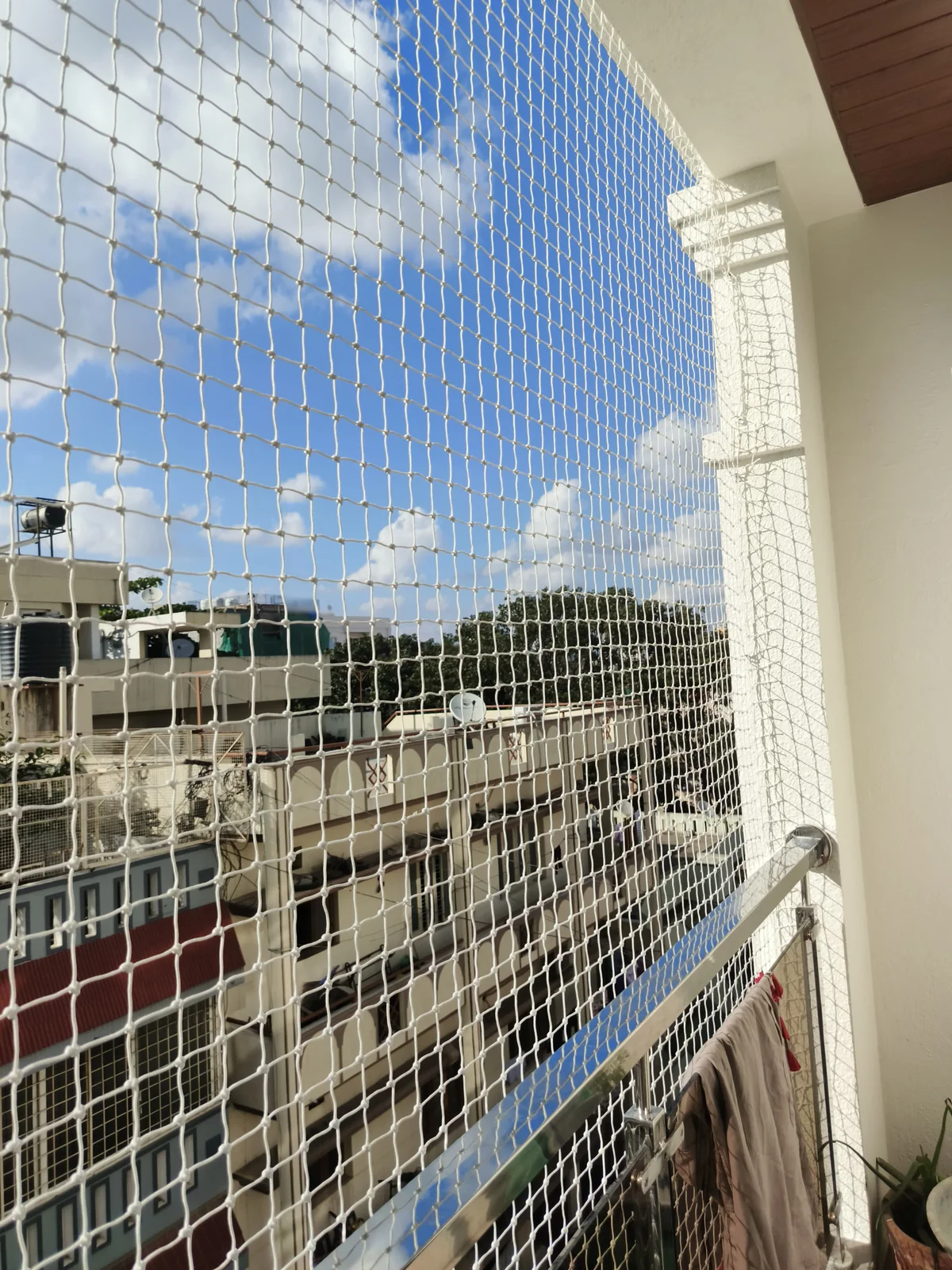 Safety net fitted across an open balcony — Home safety installations in Nerkundram, Chennai